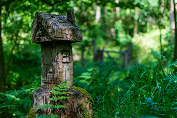 wood sculpture in the forest
