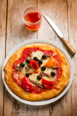 pizza with pepper anchovy and black olives