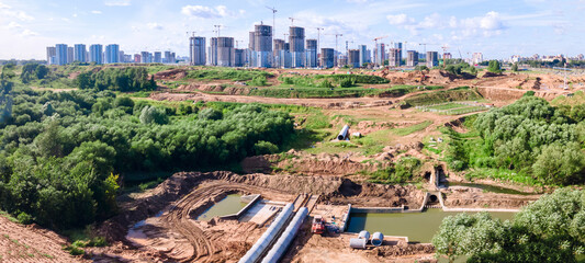 Aerial view of construction of the river drains. Construction drains to prevent flooding in the city. Drain water into the river.