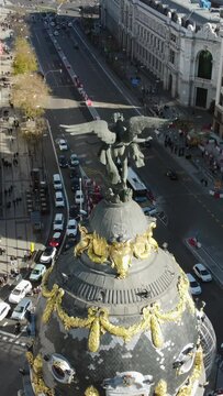 Dome of Metropolis Building and Calle de Alcala. Vertical aerial view