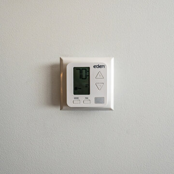 Colorado Springs, CO - July 6, 2022:The Eden Wireless Remote Thermostat By Amana With Occupancy Detector.