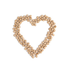 Obraz premium heart of chickpeas isolated on white background, top view