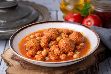 Traditional delicious Turkish foods; Bulgur soup (Turkish name; Anali Kizli, icli kofte)