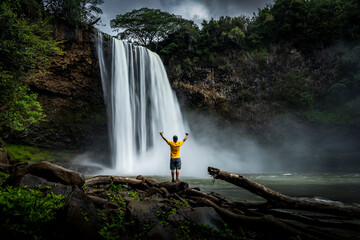 Man enjoying waterfall view