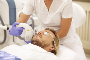 Obraz premium Photorejuvenation,Cosmetic Laser Dermatology ,dermatologist offices,laser technology.