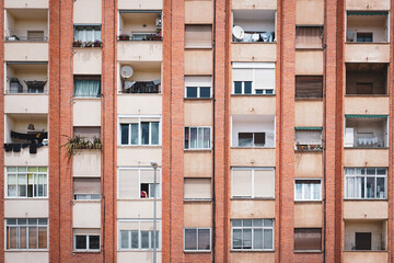 front view of a condo building of workers apartments on a city suburb. real state concept.