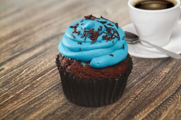 Tasty sweet cup cake and muffin and filter coffee americano.