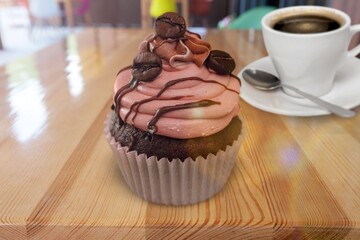 Tasty sweet cup cake and muffin and filter coffee americano.