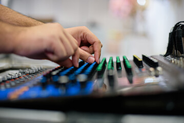 Fototapeta premium sound check for concert, mixer control, music engineer, backstage 
