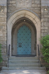 Seagreen Church Door with Wrought Iron Ornamentation