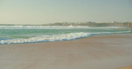 Sandy coastline with paradise tropical luxury resort for holiday, revealing geologic erosion of the sand beach, environmental protection sustainability concept. - Powered by Adobe