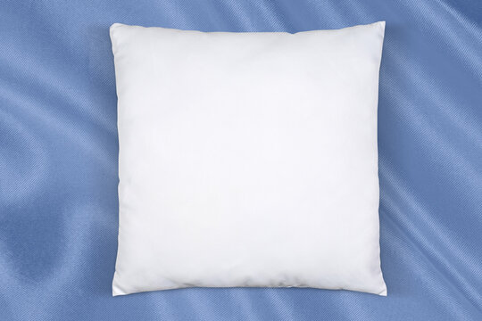 Square Throw Pillow Mockup On Baby Blue Fabric