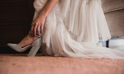 Fototapeta premium Wedding shoes are a very important accessory of the bridal /groom wedding day, that matches with the full outfit dressed, material,style, color, height depends of culture