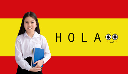 Little Asian schoolgirl and word HOLA (HELLO) against flag of Spain
