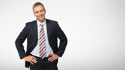 Portrait of handsome man in formal suit looking at camera smiling Confident businessman ceo boss...