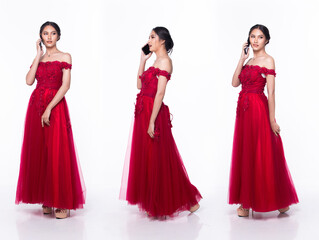 Full length body of Asian beautiful woman wear Red evening sequin gown, working internet phone