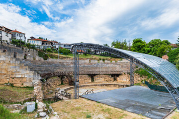 Fototapeta premium Ancient amphitheater or antique theatre of Ohrid with view of old town by Lake Ohrid in Macedonia