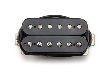Electric guitar pickup isolated on white. Humbucker or humbucking  type magnetic pickup (double coil ) isolated on white background. Screw pole piece type. Black bobbin.