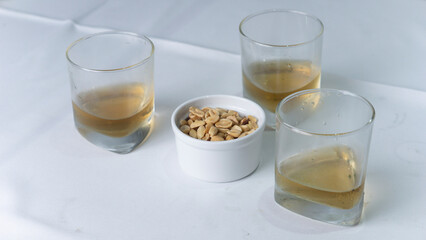 drink with nuts and side dishes