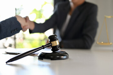 A judge's hammer or judge's gavel on the office desk