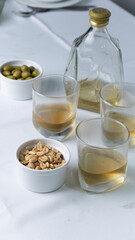 Fototapeta na wymiar drink with nuts and side dishes