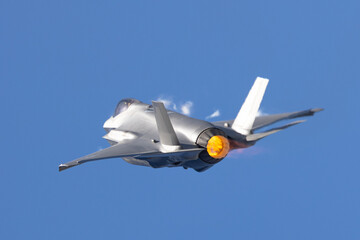 Very close tail view of a F-35A Lightning II  with afterburner on