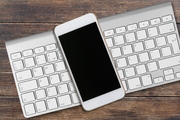 Phone with keyboard on table, request to access code enter to device interface