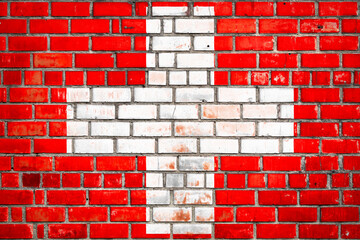 Swiss flag on a grunge brick background.