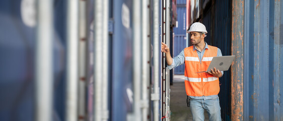 Professional industry worker of logistic concept.Engineer or foreman control loading Containers box...