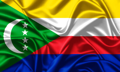 Obraz premium Comoros waving flag close up satin silk texture background