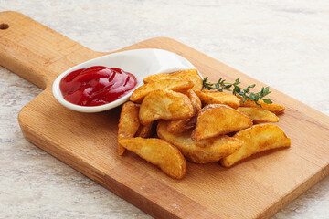 Fried rustic potato with tomato ketcup