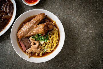 egg noodles with stewed and braised duck in brown soup