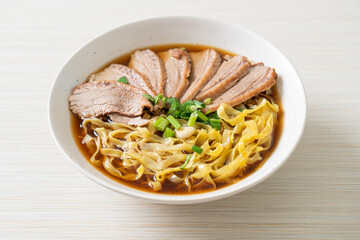 egg noodles with stewed duck in brown soup