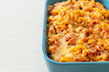 homemade macaroni bolognese with cheese