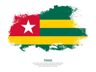 Vintage grunge style Togo flag with brush stroke effect vector illustration on solid background