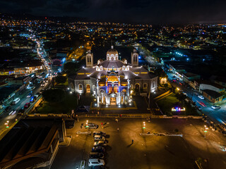 Beautiful aerial night view of the city of Cartago Costa Rica- Basilica of Our Lady of the Angels -...
