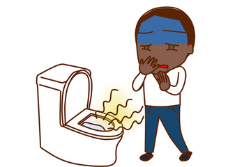 （全身斜め）トイレからする匂いが臭く、思わず顔をしかめて鼻を抑えるアフリカ系男性