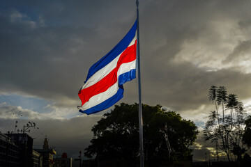 Beautiful view the Costa Rica Flag waving dramatically in the sky