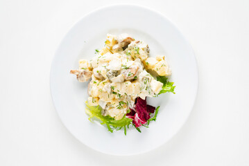 Traditional salad with cooked vegetables with mayonnaise.