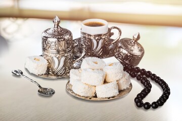 Traditional Turkish delight with Turkish tea. Ramadan Kareem celebration concept. National dishes.