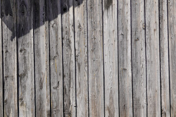 background wall facade of raw wood plank aged by time