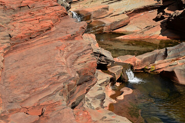 Fresh water flowing in Hamersley Gorge Karijini National Park Western Australia
