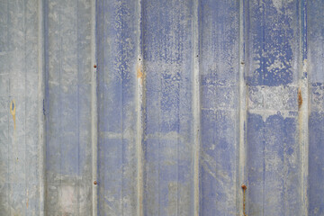 gray blue wall background in metallic metal panel with worn and degraded old paint