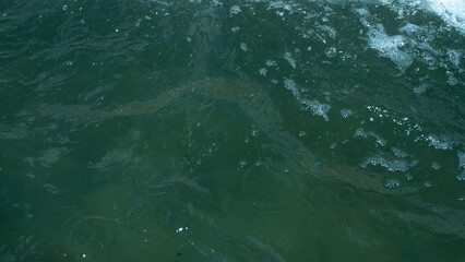 The surface of the water from above.Blue water. Surface of green-blue water. Natural texture.