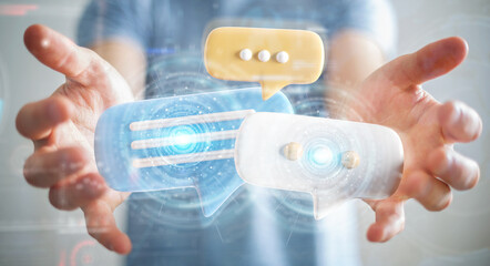 Obraz premium Businessman holding digital speech bubbles talk icons. Minimal conversation or social media messages floating between man hands. 3D rendering