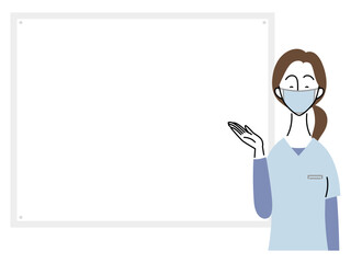 笑顔で説明する女性歯科医（水色ユニフォーム）