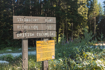 View of welcome sign Strawberry Point Recreation Site on Lillooet Lake near Pemberton