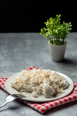 Palitaw is a small, flat, sweet rice cake eaten in the Philippines. They are made from galapong - washed, soaked, and ground malagkit.