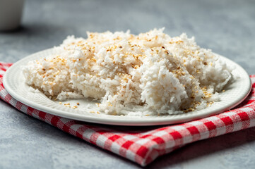 Palitaw is a small, flat, sweet rice cake eaten in the Philippines. They are made from galapong - washed, soaked, and ground malagkit.