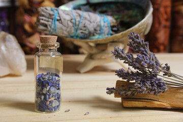 Dried Lavender With Palo Santo Sticks and Abalone Shell For Smudging in Background Shallow DOF